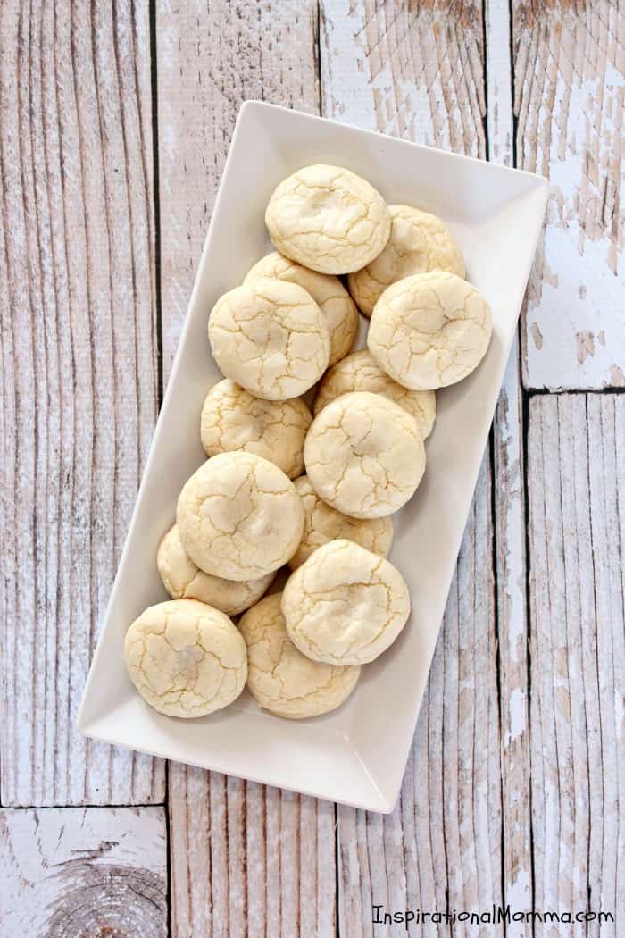 These Caramel Filled Sugar Cookies will melt in your mouth and blow your mind. The smooth caramel is the perfect surprise inside a soft, chewy cookie!