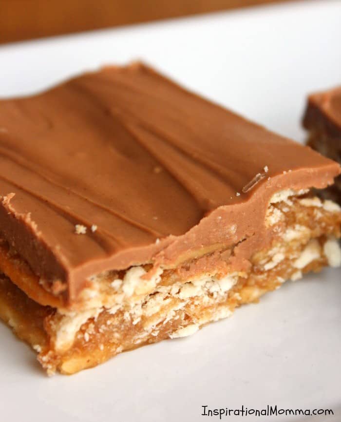 These Homemade Kit Kat Bars are filled with ooey-gooey caramel, surrounded with crunchy, flaky crackers, and covered with a perfect chocolate blend!