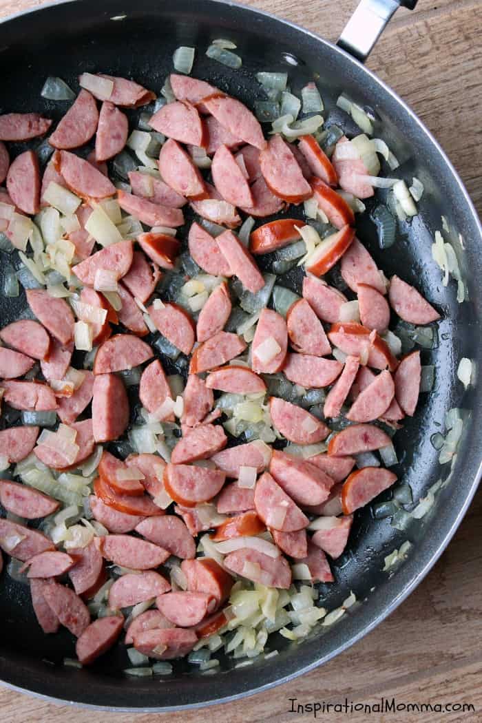 Ready in just 20 minutes, this One-Pan Cheesy Kielbasa Pasta will make everyone in your family smile! Simple and delicious! #inspirationalmomma #onepancheesykielbasapasta #onepan #kielbasa #cheesy #pasta #dinner #recipe