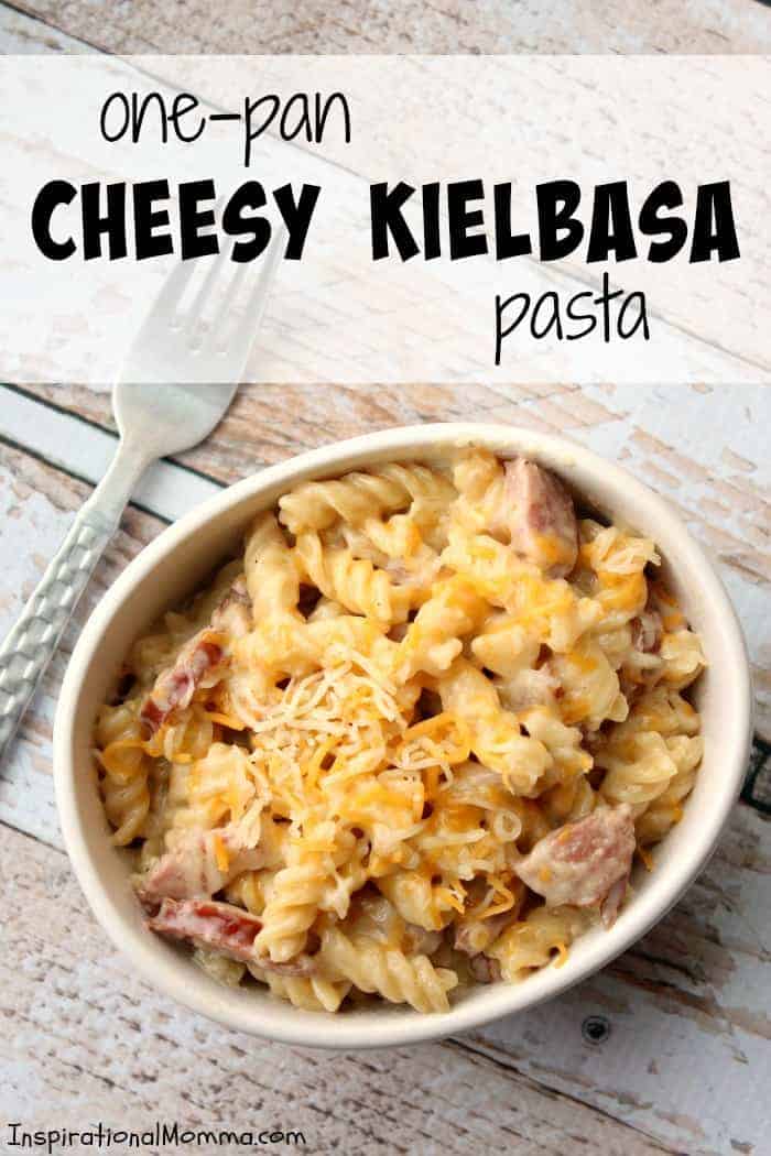 Ready in just 20 minutes, this One-Pan Cheesy Kielbasa Pasta will make everyone in your family smile! Simple and delicious! #inspirationalmomma #onepancheesykielbasapasta #onepan #kielbasa #cheesy #pasta #dinner #recipe