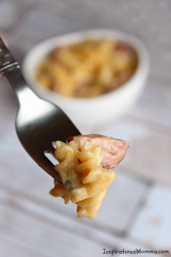 Ready in just 20 minutes, this One-Pan Cheesy Kielbasa Pasta will make everyone in your family smile! Simple and delicious! #inspirationalmomma #onepancheesykielbasapasta #onepan #kielbasa #cheesy #pasta #dinner #recipe