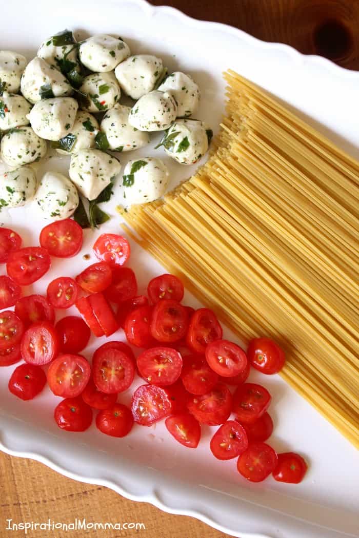 Caprese Pasta Salad is light and fresh! A perfect side dish for any meal! Easy to make and filled with a great combination of ingredients!