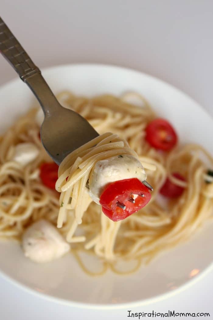 Caprese Pasta Salad is light and fresh! A perfect side dish for any meal! Easy to make and filled with a great combination of ingredients!