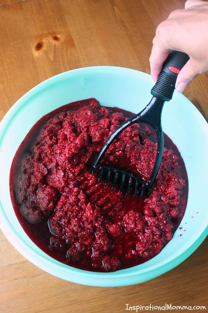 This Old-Fashioned Raspberry Freezer Jam will become a staple in your household! Sweet, delicious, and simple to make...even you can do it! 