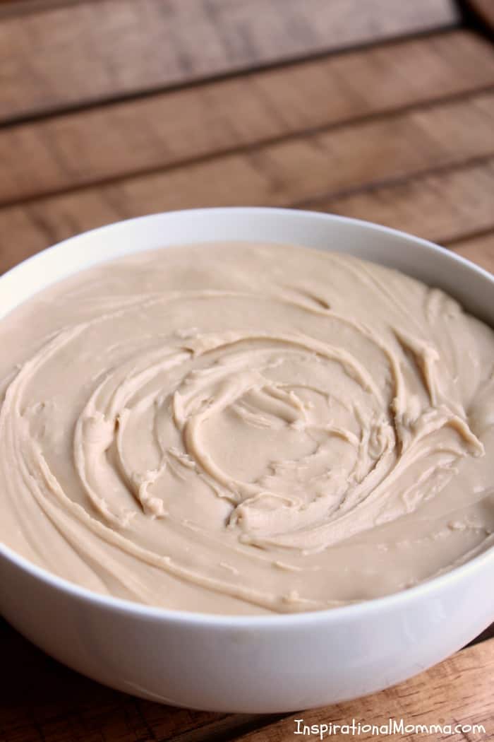 This Creamy Caramel Frosting is easy to make and the perfect compliment to cakes, muffins, breads, and cupcakes. You'll find yourself licking out the bowl!