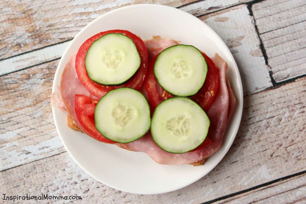 Make it fast and make it delicious! This Fresh Ham, Cucumber, & Tomato Sandwich is perfect on-the-go or at home! #SandwichWithTheBest
