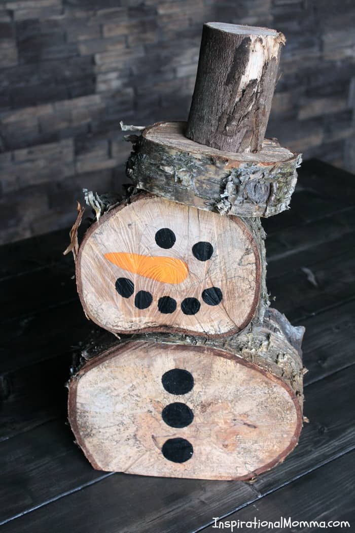 This DIY Log Snowman is so simple to make at a minimal cost. He is quite cute and is sure to create a festive winter wonderland!