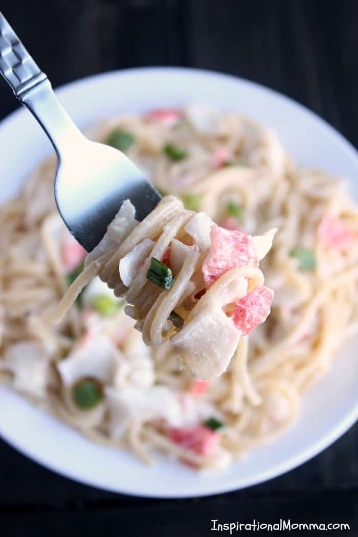 This Crab Alfredo Pasta is easy to make and even easier to enjoy! Sweet crab smothered in a creamy sauce served over a bed of pasta...absolutely delicious!