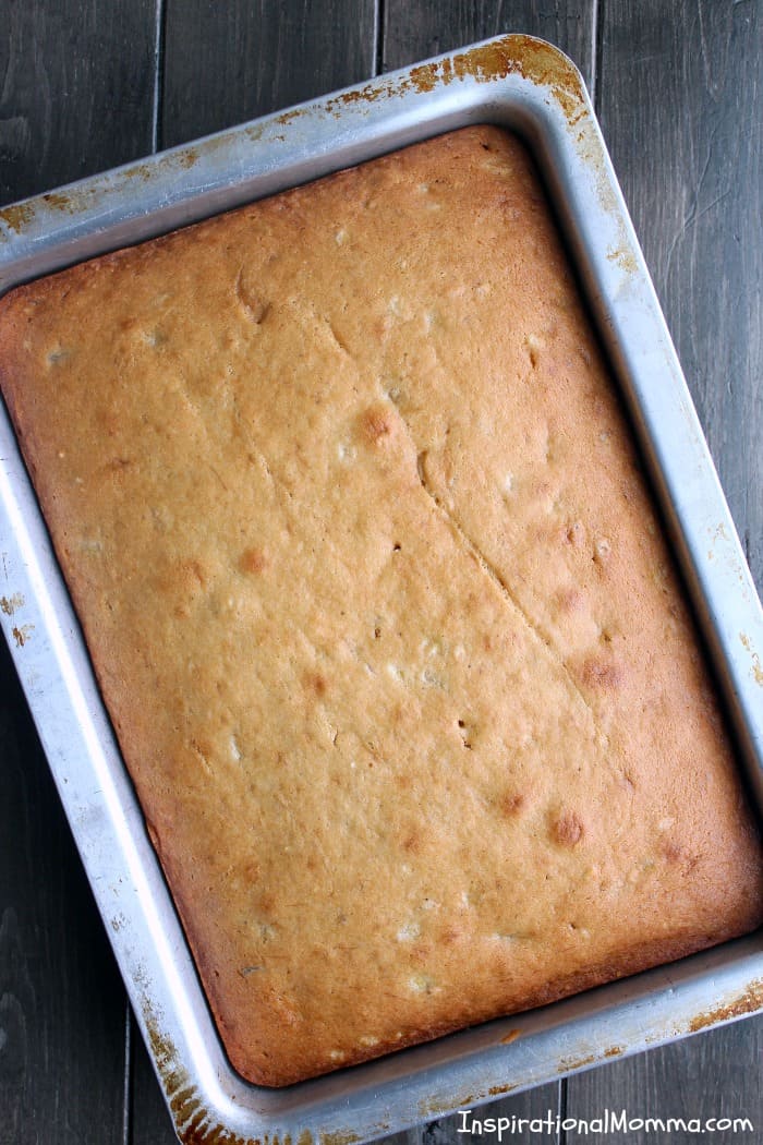 This Banana Cake with Cream Cheese Frosting is so moist and soft it melts in your mouth. Covered in creamy cream cheese frosting, it is complete perfection!