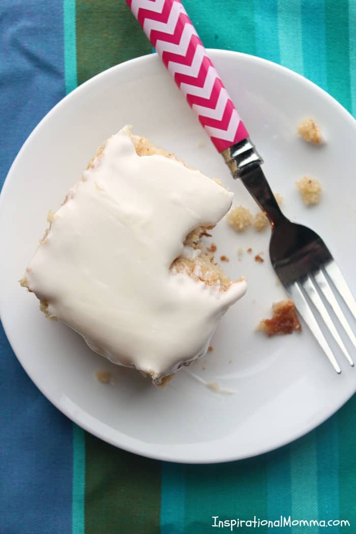 This Banana Cake with Cream Cheese Frosting is so moist and soft it melts in your mouth. Covered in creamy cream cheese frosting, it is complete perfection!