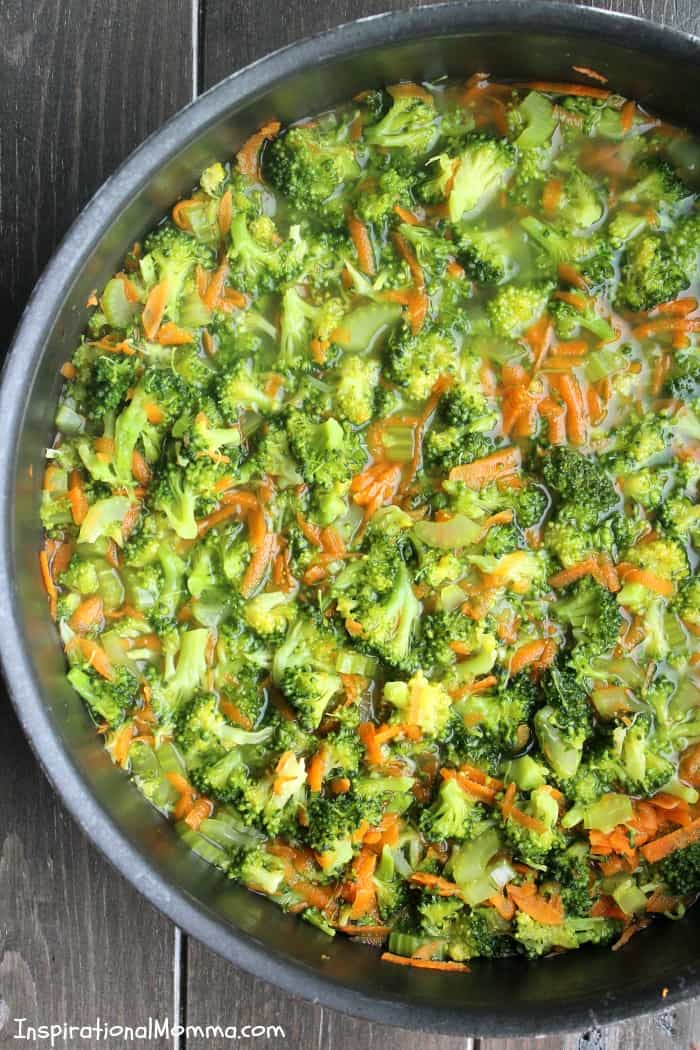 Creamy Cheesy Broccoli Soup is quick, easy and delicious! Small pieces of broccoli and carrots smothered in flavorful creamy deliciousness!