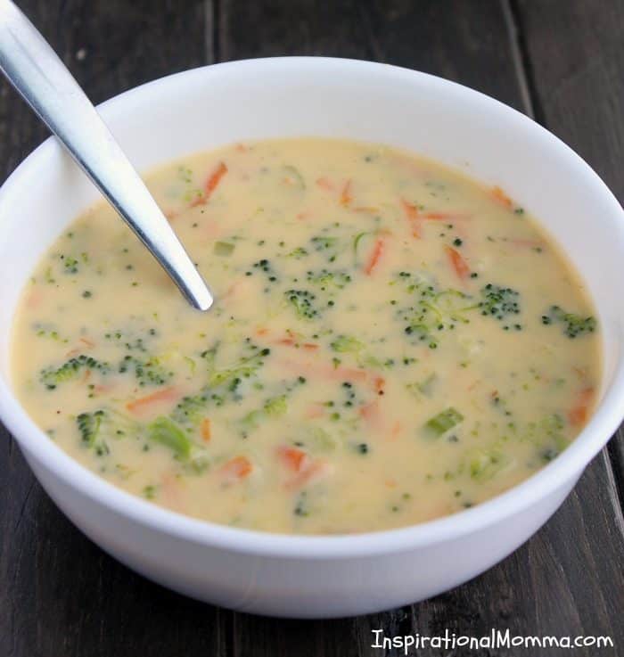 Creamy Cheesy Broccoli Soup is quick, easy and delicious! Small pieces of broccoli and carrots smothered in flavorful creamy deliciousness!