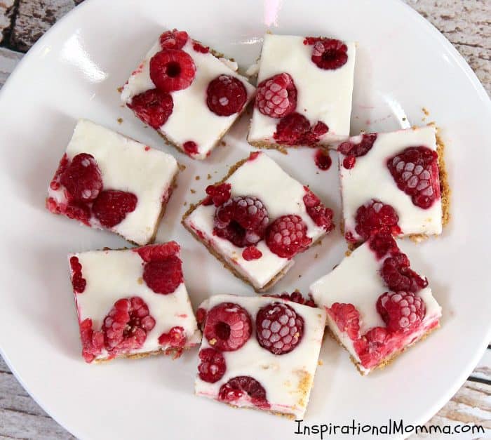 Frozen Raspberry Yogurt Bites are a cool, sweet treat that are easy to make and absolutely delicious! Made with 5 healthy ingredients, it will quickly become a favorite!