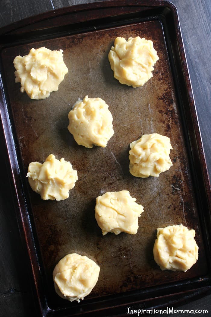 Light and fluffy Homemade Cream Puffs are smothered with homemade whipped cream and topped with sliced bananas. Easy to make and even easier to enjoy!