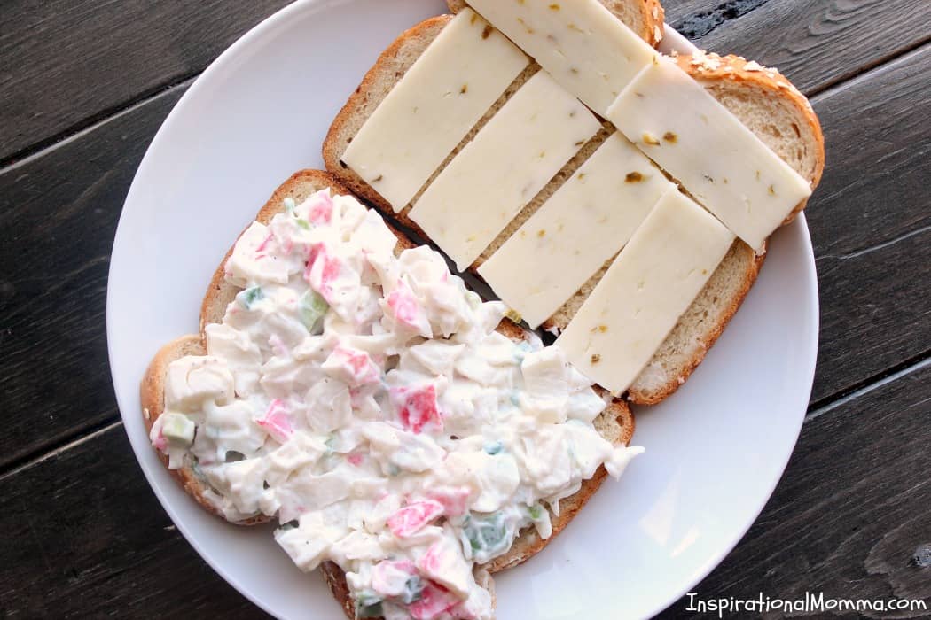This Creamy Crab Grilled Cheese is simple and filled with flavors that will satisfy you! Creamy crab sandwiched between crispy, golden brown bread. Yum!