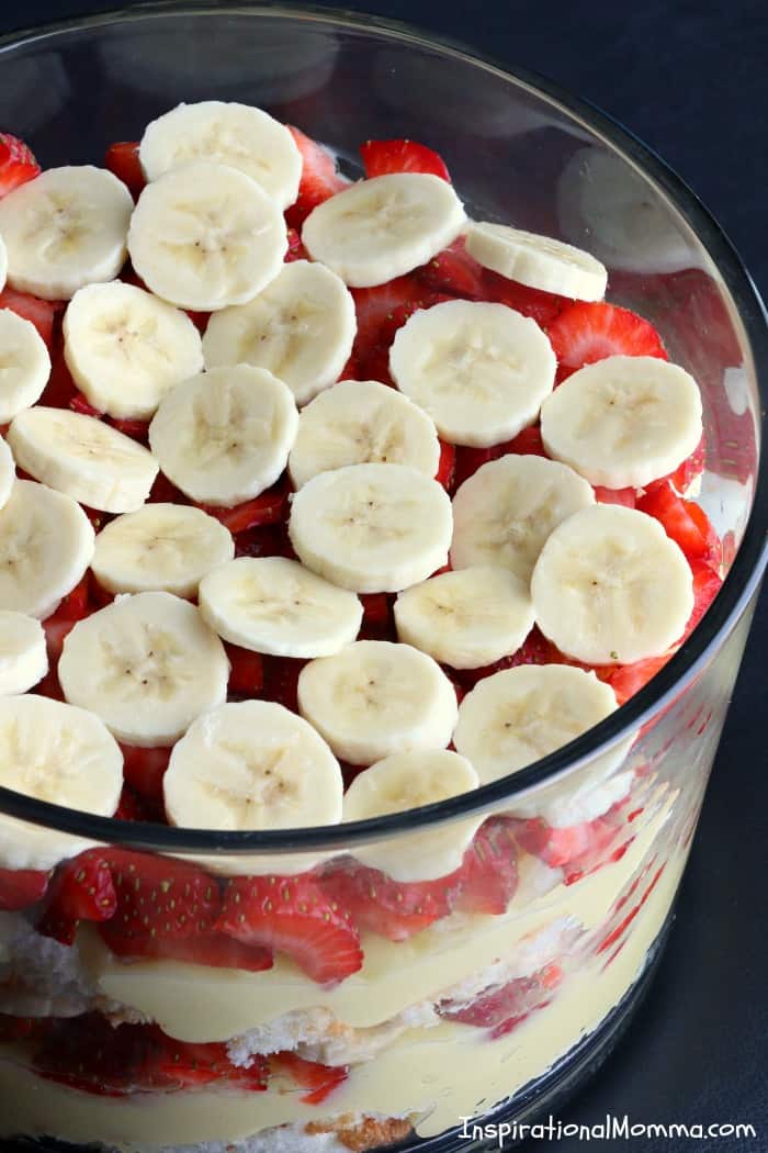 This Creamy Dreamy Banana Split Trifle is filled with layers of fresh fruit, fluffy angel food cake, and creamy pudding! A dessert everyone will love!