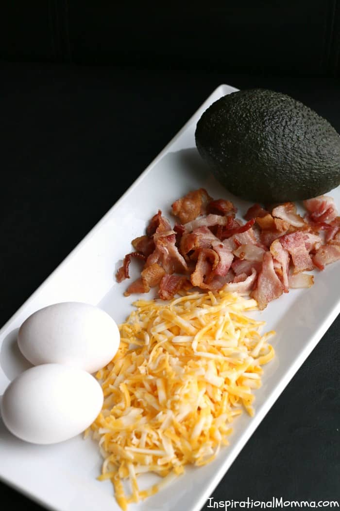 Avocado Eggs with Bacon & Cheese are a quick and easy meal for any time of the day! Being low in carbs and big on flavor, you can't resist them!