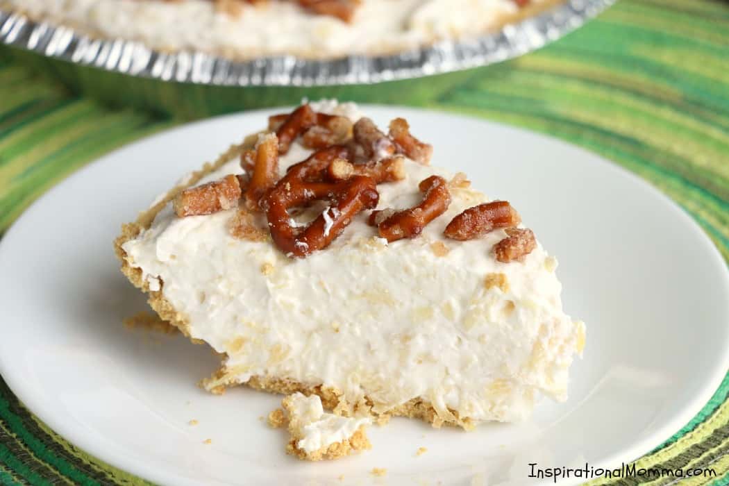 Creamy Pineapple Fluff Pie is a perfect combination of smooth and crunchy, sweet and salty. This simple pie comes together quickly and will become the talk of the party!