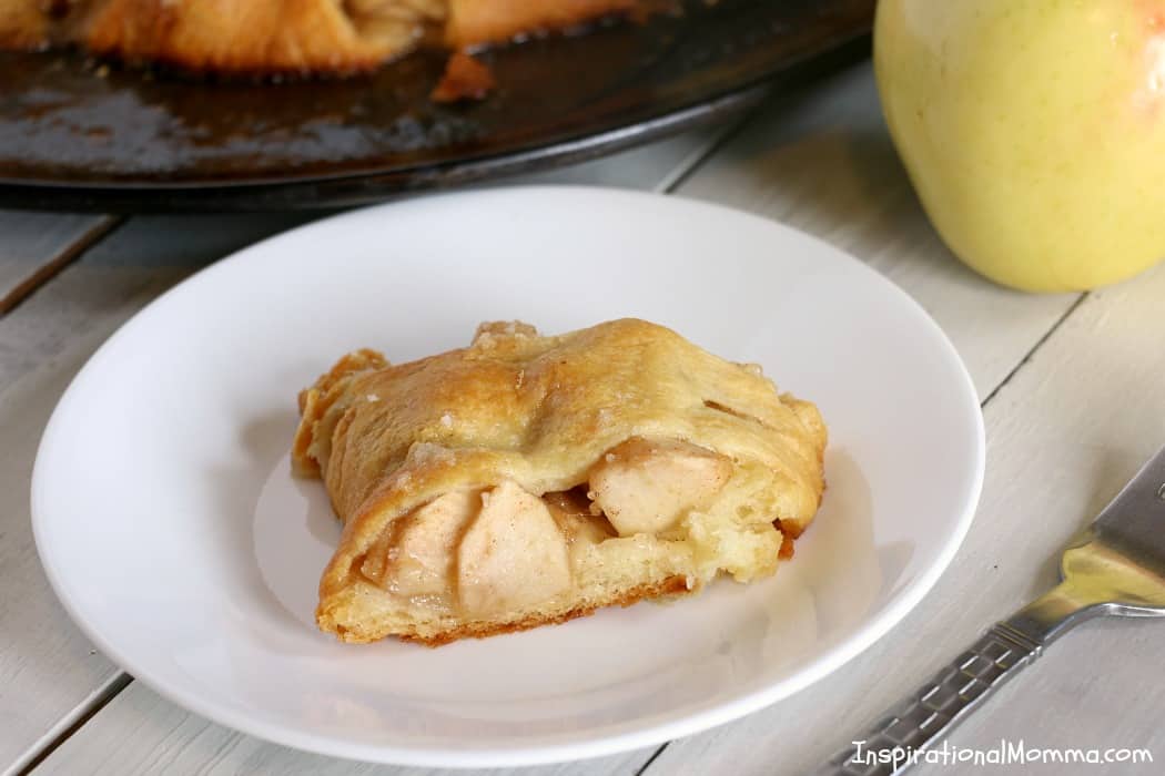 This Apple Pie Crescent Ring is packed with sweet flavors of a traditional apple pie and wrapped in a light, golden crust!