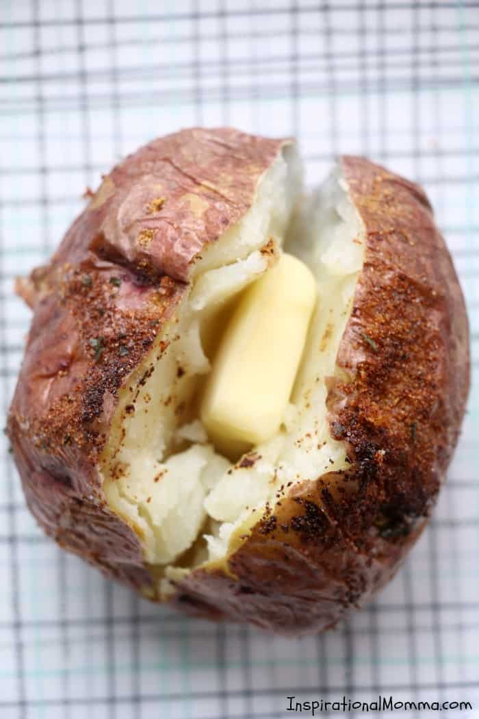Easy Air Fryer Baked Potatoes are drizzled with olive oil and sensationally seasoned. Cooked to perfection in your Air Fryer, you will make them again and again! #InspirationalMomma #AirFryer #bakedpotatoes #potatoes #baked #quick #easy 