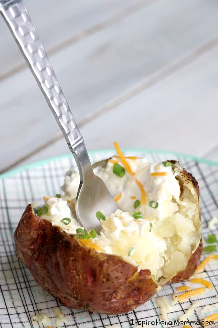 Easy Air Fryer Baked Potatoes are drizzled with olive oil and sensationally seasoned. Cooked to perfection in your Air Fryer, you will make them again and again! #InspirationalMomma #AirFryer #bakedpotatoes #potatoes #baked #quick #easy 