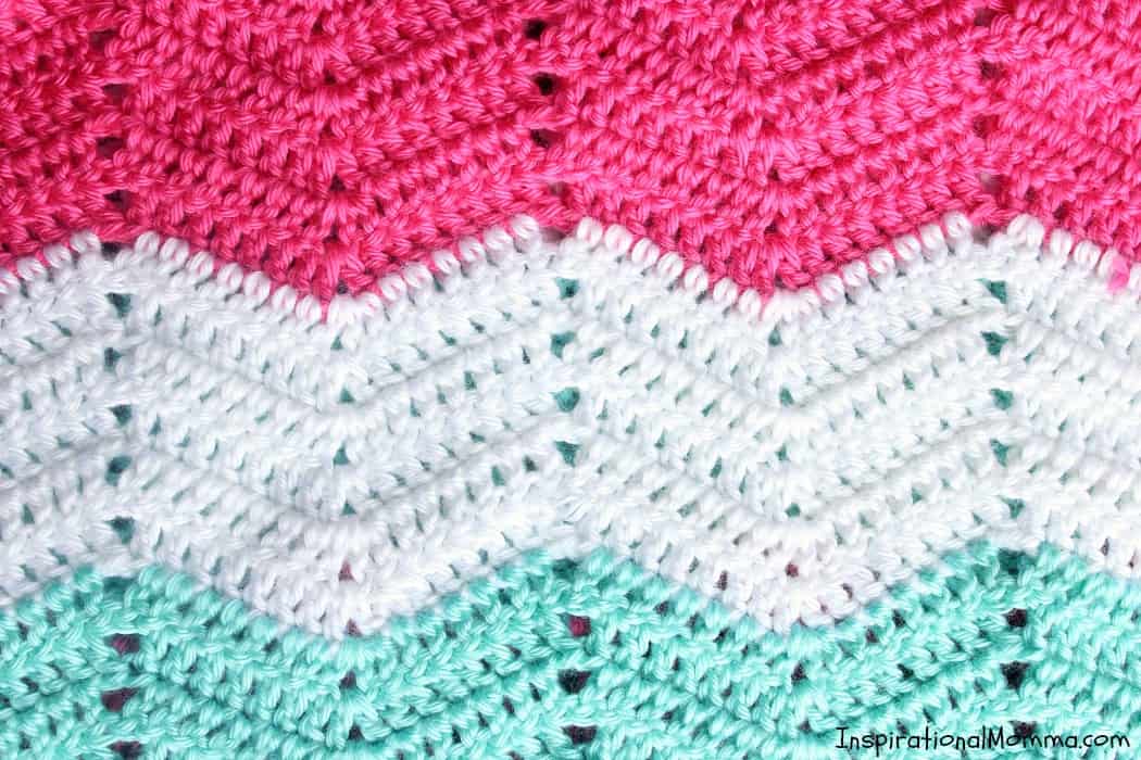 This Sweet Chevron Crochet Baby Blanket Free Pattern will help you create a perfect gift for someone special. Using simple crochet stitches, this pattern is great for beginning crocheters! #InspirationalMomma #CrochetBabyBlanket #BabyBlanket #Crochet #Blanket #FreePattern #Pattern #Handmade #Homemade #DIY