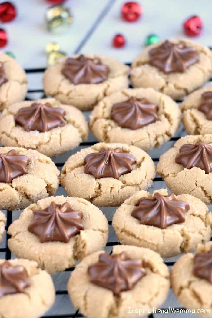 Traditional Peanut Butter Blossoms are soft, chewy, and tasty. They are quick and easy cookies that turn out perfect every time! A classic sweet treat! #InspirationalMomma #PeanutButterBlossoms #PeanutButter #Cookies #Desserts #Christmas #ChristmasCookies