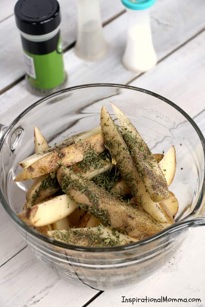 Air Fryer Potato Wedges are a perfect side dish to any meal. Simple to make and easy to enjoy, Air Fryer Potato Wedges will become a family favorite! #InspirationalMomma #airfryerpotatowedges #airfryer #potatowedges #sidedish #potatoes #recipe #recipes #appetizers #appetizer