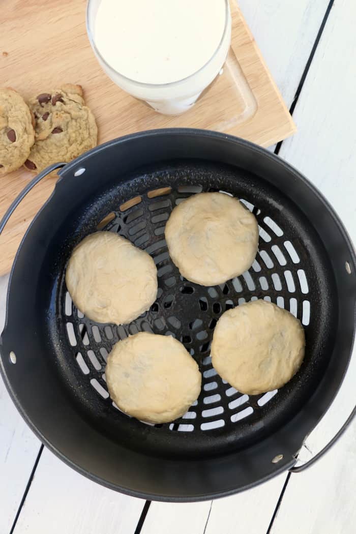 Air Fryer Fried Chewy Chocolate Chip Cookies are a sweet, delicous reason to love your air fryer. Crispy on the outside, warm and chewy on the inside. #inspirationalmomma #airfryer #chewychocolatechipcookies #chocolatechips #cookies #fried #dessert #desserts #recipe