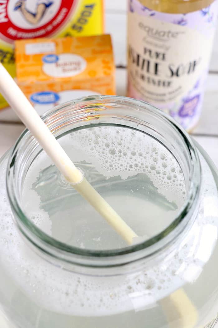 This Homemade Liquid Laundry Detergent will leave your clothes clean and smelling fresh while saving you money. Made with just 5 ingredients, it is so easy! #inspirationalmomma #homemadeliquidlaundrydetergent #laundrydetergent #homemade #diy #cleaning #cleaner #laundry #momonabudget