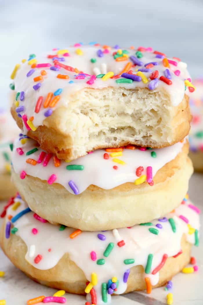 This Homemade Potato Donut Recipe makes soft, fluffy delicious donuts. Glazed with sweet icing, they are irresistible and absolutely addictive! #inspirationalmomma #homemadepotatodonutrecipe #donutrecipe #homemadedonuts #doughnuts #icing #homemadedoughnuts #homemade #deepfried
