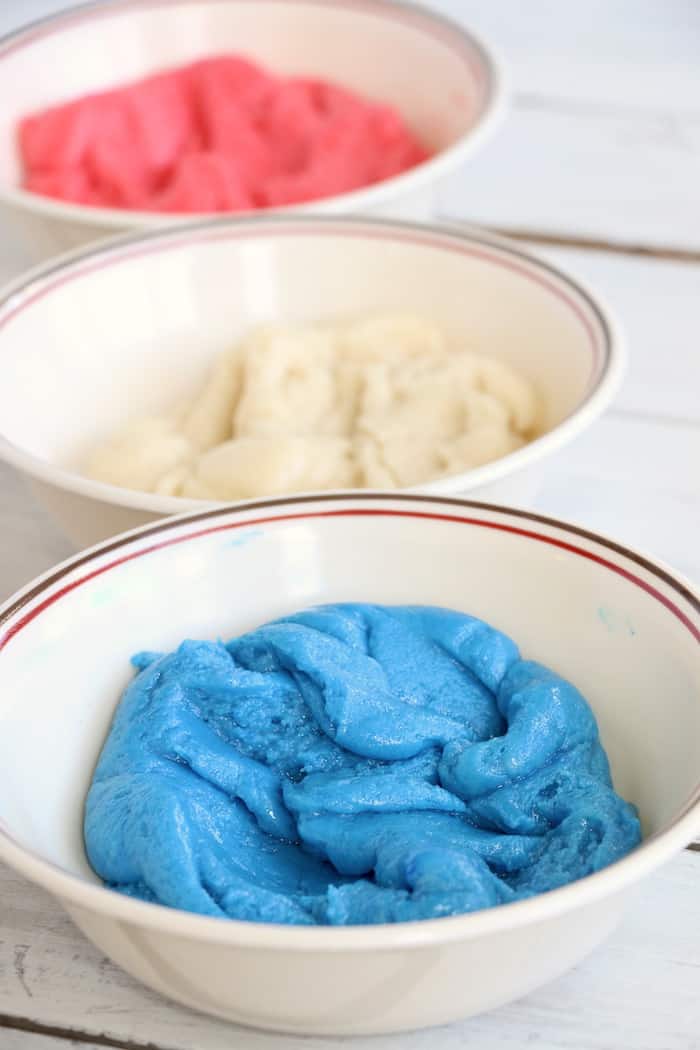 With only three ingredients, Red White and Blue Cake Mix Cookies are an easy way to show your American pride. These cookies are soft, chewy, and delicious! #inspirationalmomma #redwhiteblue #cakemixcookies #cakebattercookies #cookies #dessert #desserts #recipe #patriotic #American #MemorialDay #4thofJuly