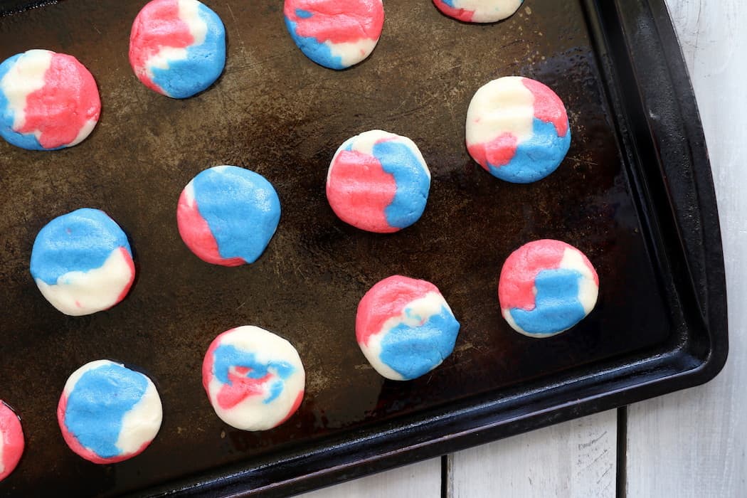 With only three ingredients, Red White and Blue Cake Mix Cookies are an easy way to show your American pride. These cookies are soft, chewy, and delicious! #inspirationalmomma #redwhiteblue #cakemixcookies #cakebattercookies #cookies #dessert #desserts #recipe #patriotic #American #MemorialDay #4thofJuly