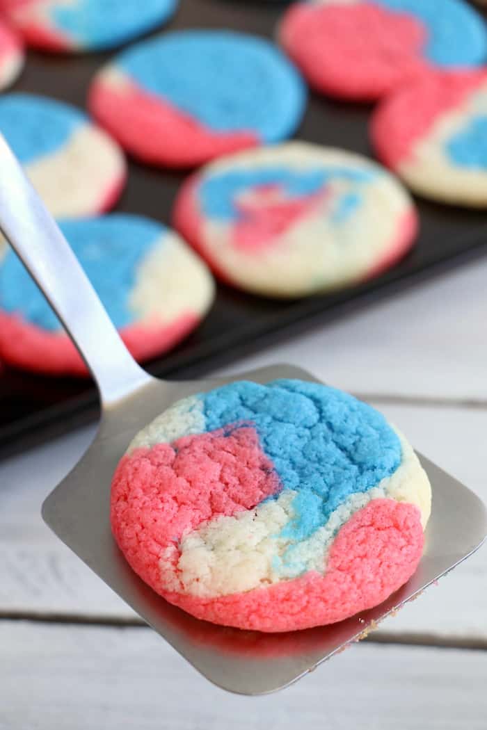 With only three ingredients, Red White and Blue Cake Mix Cookies are an easy way to show your American pride. These cookies are soft, chewy, and delicious! #inspirationalmomma #redwhiteblue #cakemixcookies #cakebattercookies #cookies #dessert #desserts #recipe #patriotic #American #MemorialDay #4thofJuly