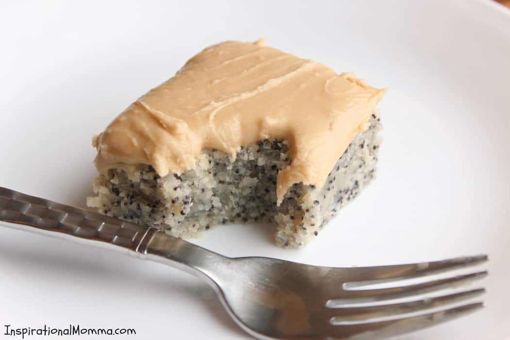 Homemade Poppy Seed Cake is moist with amazing flavor. An old family recipe that you will soon adopt! Topped with caramel frosting, it is sure to please!