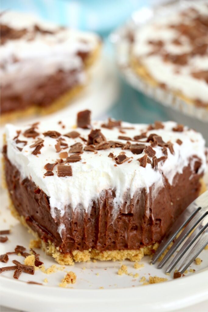 Closeup shot of slice of no bake chocolate pie with bite taken out
