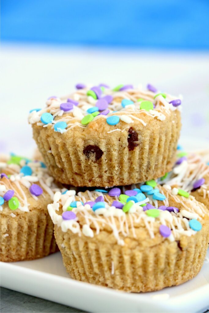 Closup shot of muffin tin chocoalte chip cookies stacked atop one anohter