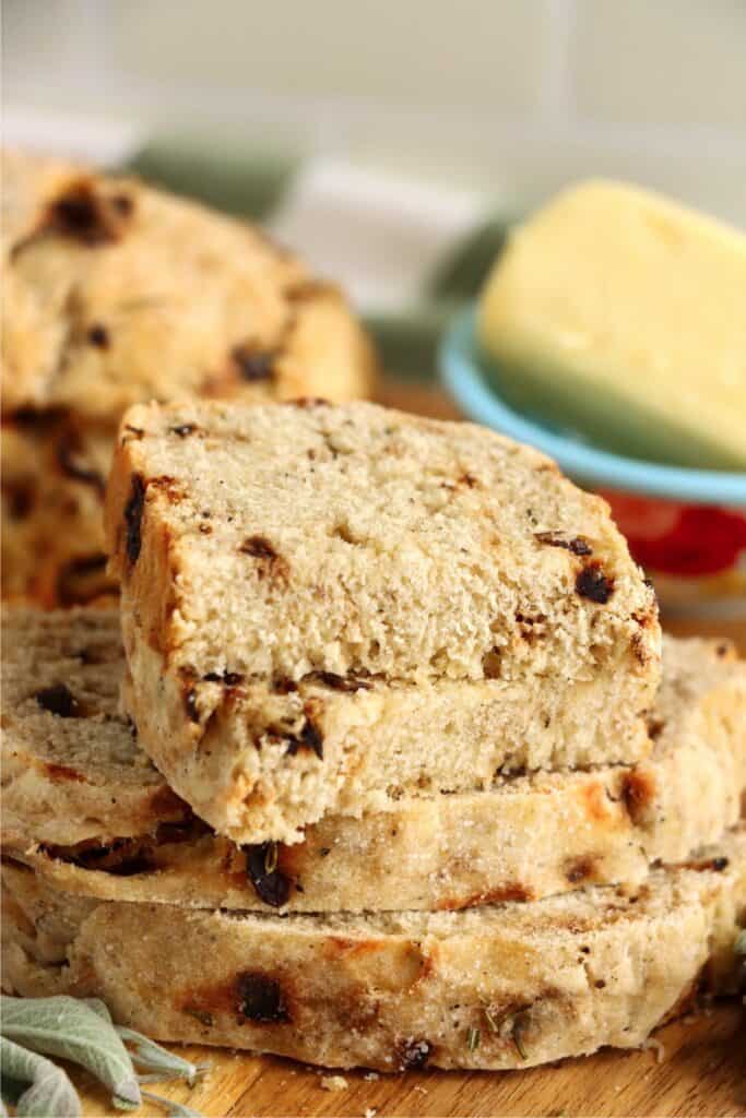 Closeup shot of slices of sage bread with onion stacked atop one another. 