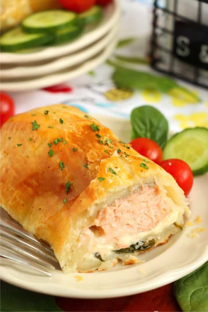 Closeup shot of sliced salmon Wellington. 